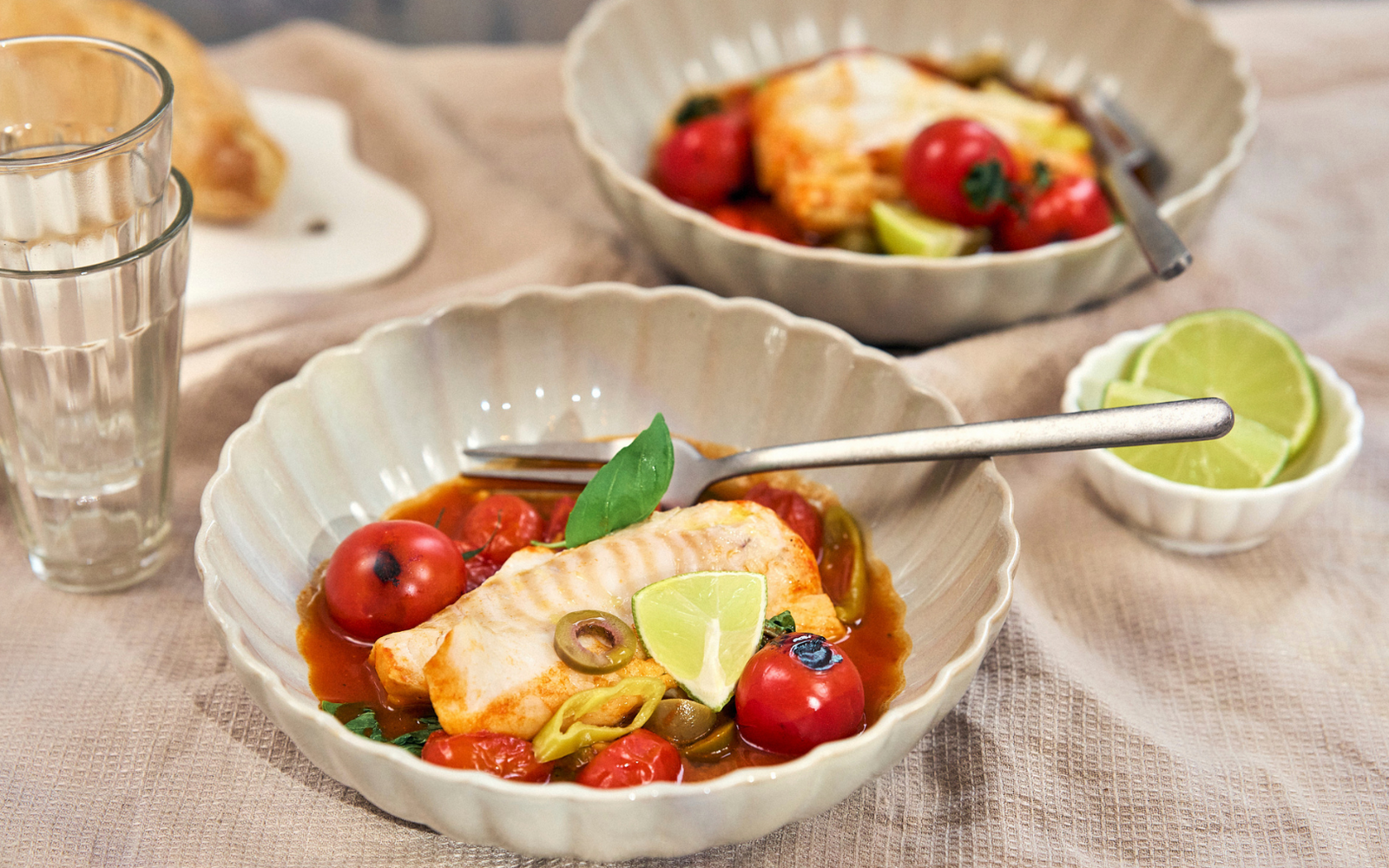Merluzzo in salsa speziata di pomodorini tostati
